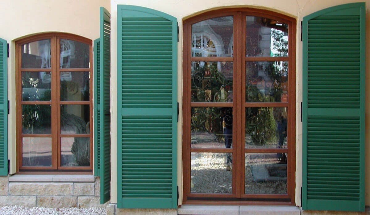 Arched wooden windows.